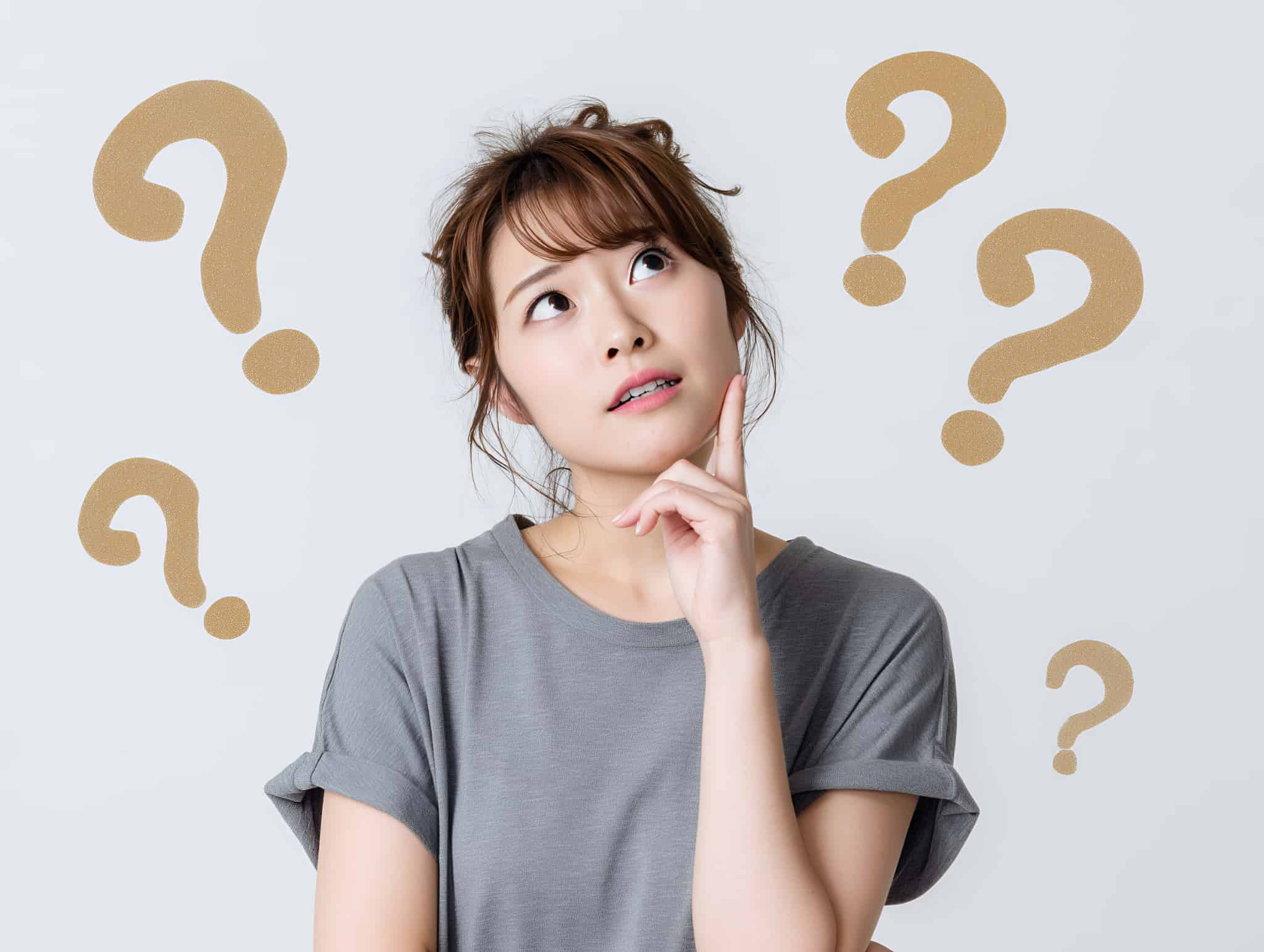 ホワイトニングで痛いと感じるのはなぜか考える女性
